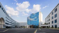 Guiyang Riverside Grand Court Hotel (Guiyang East Railway Station Normal University Subway Station) Hotels in Vicinity of Xintianzhai