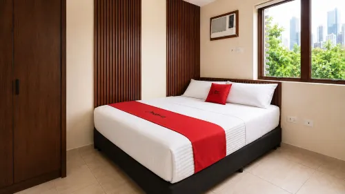 RedDoorz at Mola Suites near Shopwise Makati City - 주차장