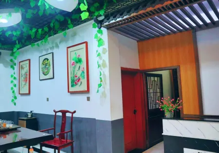 Qiyuan Homestay (Meiqi Miaozhai Branch) Отели в г. Гучжан