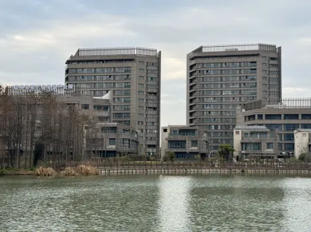 Shanghai Meier Cinema Apartment (Ping'an Gangyang Road Branch) Отели рядом с достопримечательностью «Shanghai Technical Institute of Electronics & Information»