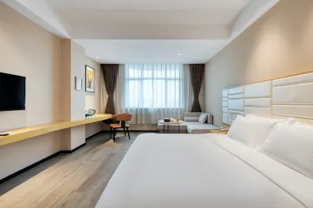 Jinshi Business Hotel(Haimen Commercial Pedestrian Street Branch) Отели рядом со станцией Haimen Railway Station