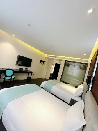 Wanpeng Xiting Hotel Отели рядом с достопримечательностью «Huanghe Shequ Guojia Dizhi Park»