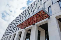 Steigenberger Airport Hotel Berlin Hotels near REWE