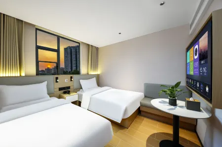 Meitu Hotel Отели рядом с достопримечательностью «Huanghe S & T College School of Information Engineering»