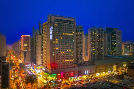 Qinin Hotel (Xining Limeng Pedestrian Street) Отели рядом с достопримечательностью «Qinghai Traffic Vocational and Technical College»