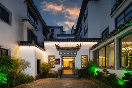 Gusse Hotel (Huangshanyi County Huizhou Ancient City Branch) Отели в г. Шэсянь