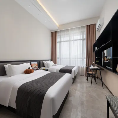 Yuejin Rezen Apartment Hotel (Zhuhai International Convention and Exhibition Center Branch) Hotel dekat Stone Exposition Park