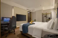 Huanyang E-Sports Hotel (Miluo Tiyu Lane)