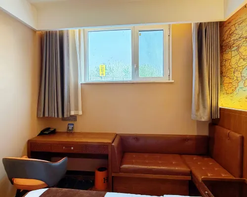 ZK Hotel (yizhuangjingjikaifaquMaqiqiao Branch) Zimmer Photos