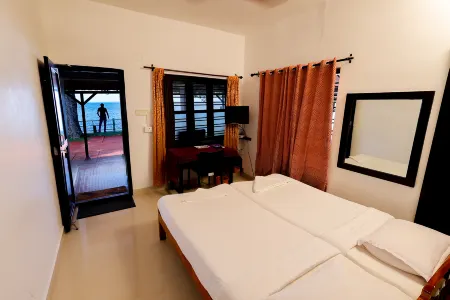 ILLIKKALAM Lakeside Cottages Kumarakom Kerala Отели в г. Кумараком
