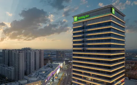 Holiday Inn Tianjin Xiqing Отели в г. Тяньцзинь