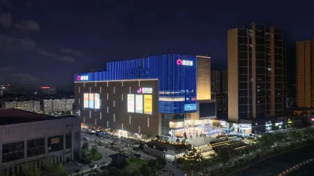 Weina Hotel (Xinyang Pingqiao Century Square Store) Отели рядом со станцией Xinyang East Railway Station