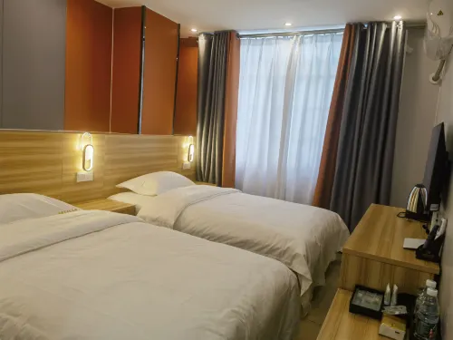 Wankelai Business Hotel (Hechi Jinchengjiang Zhiye Xueyuan)