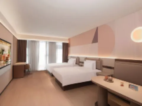 Orange Hotel (Baoying Peiyou International Baitian North Road) โรงแรมในเป่าหยิง