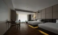 Yi Chi · Qiu Shi Tangchi Hotel (Guiyang Huayuan Garden Twin Towers Dolphin Square Store) Hotels near Baibu Bridge