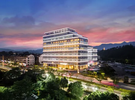 Crystal Orange Hotel Taizhou Xianju Отели рядом с достопримечательностью «Yongan River Drifting»