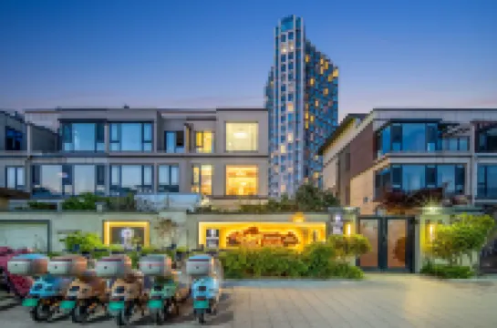 Floral Hotel·Free Travel Beach Hotel (Evergrande Golden Beach Branch) 칭다오 호텔