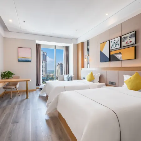 Jinniu Business Hotel (Jiangyou Station Huopao Street)