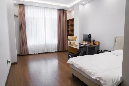 Zhiyin E-Sports Hotel (Shifu East Road) Отели в г. Жуйчан