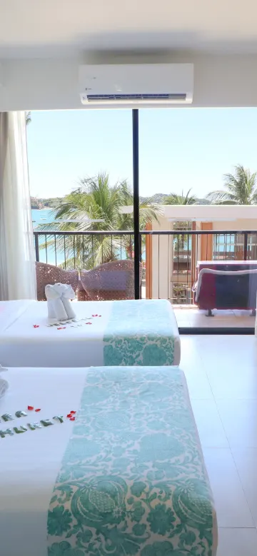 ห้องดีลักซ์ 2 ห้องนอนเชื่อมต่อกัน มีบัลคอนี