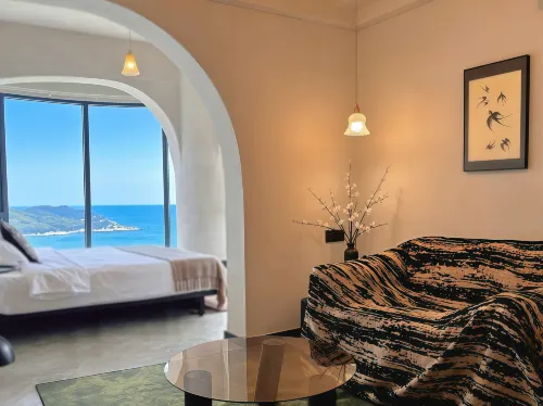 Yunya Yedu | SunKissed · Muguang Seaside Lodge (Qing'ao Bay) - balcón