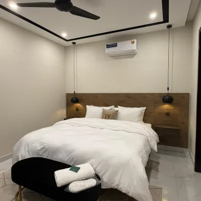 Address 12 Apartments Model Town Lahore Hotels near Township