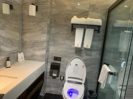 Monsoon Hotel (Lichuan Bus Terminal Tenglongdong Visitor Center) Отели в г. Личуань