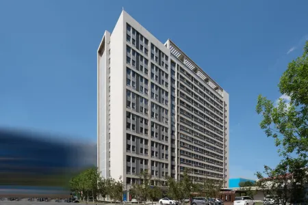 Youtu Boutique Holiday Apartment (Weihai Jiulongcheng Zhihuigu Branch) Отели рядом со станцией Weihai Railway Station