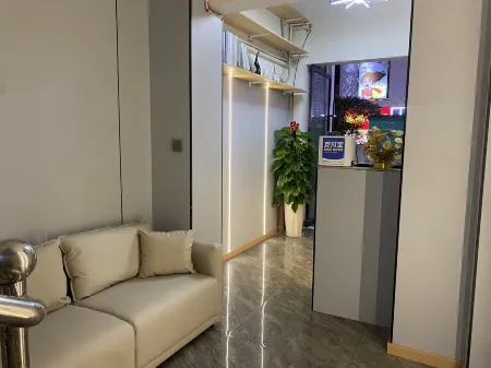 Longshan Yili Apartment Отели рядом с достопримечательностью «Longfeng Square»