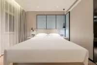 Echarm Hotel (Huanggang Macheng Wenhua Xiaozhen Guangchang) Hotel di Macheng
