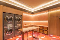 Orange Hotel (Xinyang Gushi Branch) Hotels in Gushi