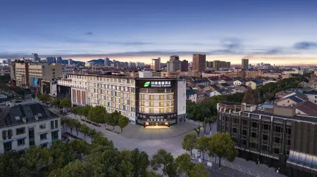 Four Seasons Qingteng Hotel (Cixi Suntang North Road) Отели в г. Циси