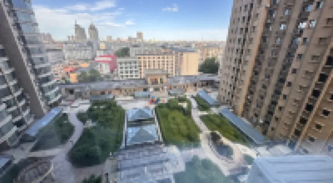 Qiqihar Mingshi Apartment - Condos