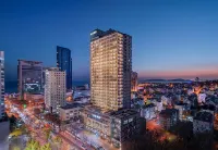 Madison Hotel Qingdao City Center (May Fourth Square) فنادق في 