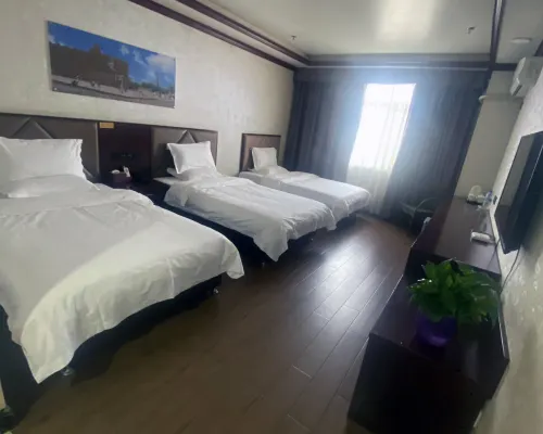 Hua Sheng Hotel Rooms Photos