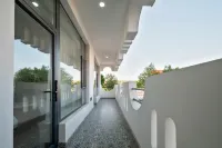 Ku'erdening Fanjing Museshe Hotel - parcheggio