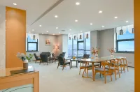 Gloria Plaza Hotel Qingdao Отели в г. Циндао