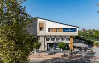 Fora Inn Lara - Business