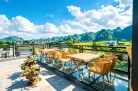 Xingyi Blue Moon Bay Xinglin Courtyard Homestay (Wanfenglin Scenic Area Shangnahui) - พร้อมอาหารเช้า