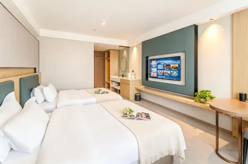 Zhalantun De Man Business Hotel - parking