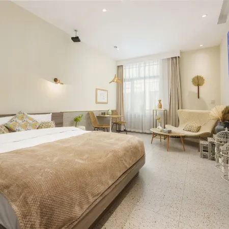Dalian Fiveinn·5 Haisu Designer Homestay Отели рядом с достопримечательностью «Лаохутан Парк»