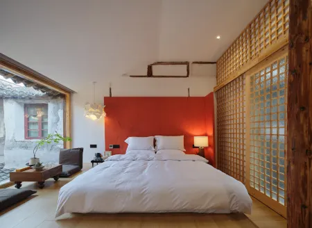 Zhujiajiaozhu Street Gexiyuan Tea House Отели рядом с достопримечательностью «Taohua Island»