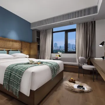 Weibayiju Residence (Guangzhou Shangxiajiu Changshou Road Subway Station Store) Отели рядом с достопримечательностью «Ли-Ван»