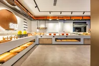 โรงแรม Ni Hao (สถานีรถไฟเซี่ยงหยาง ถนนซิงฟู่)