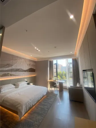 Yunduo Manju Hotel (Wanda Branch) Отели рядом с достопримечательностью «Taihe Gymnasium»