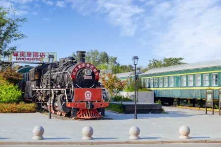 Green Train Leisurely Time Отели рядом с достопримечательностью «Longchuan Square»