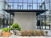 Ori·Ju Hotel (Lanxi Baolong City Plaza) Отели рядом с достопримечательностью «Пассажирский Центр Лэньчжэнь»