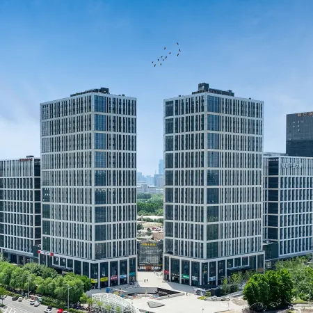 Yuan Art Hotel Отели рядом с достопримечательностью «Школа Чуньхуа, Новый район, Цуэндун»