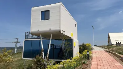 Apple Cabin Bed and Breakfast Hotel dekat Yueying Quanlong