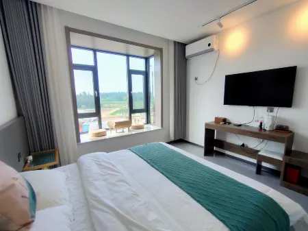 Weilanxuan Lake View Homestay (Weishandao Scenic Area) Отели в г. Вейшань